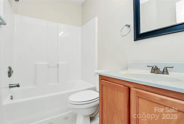 a bathroom with a sink a toilet and a bathtub