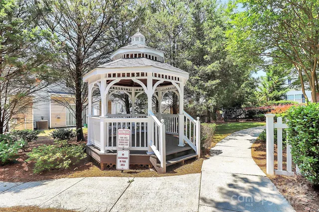 a view of front door of house with yard