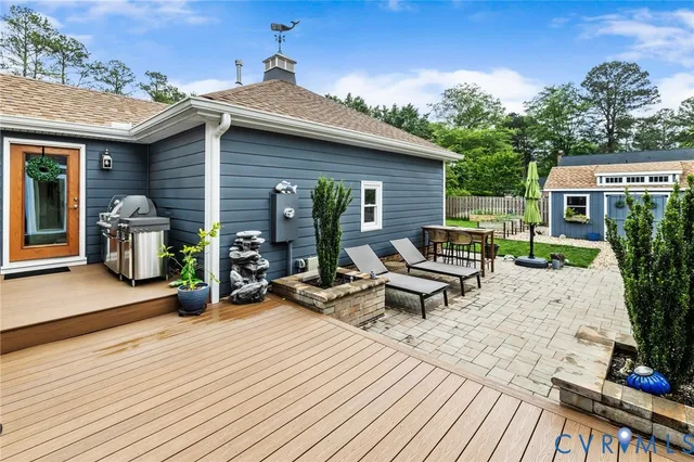 a view of a patio with a yard