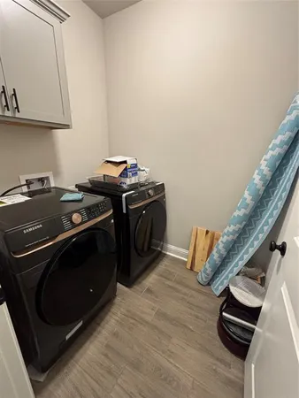a stove top oven sitting inside of a kitchen
