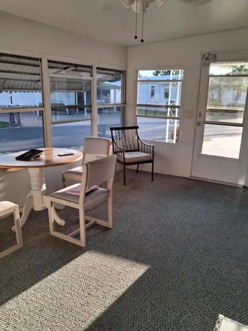 a living room with a couch and a table