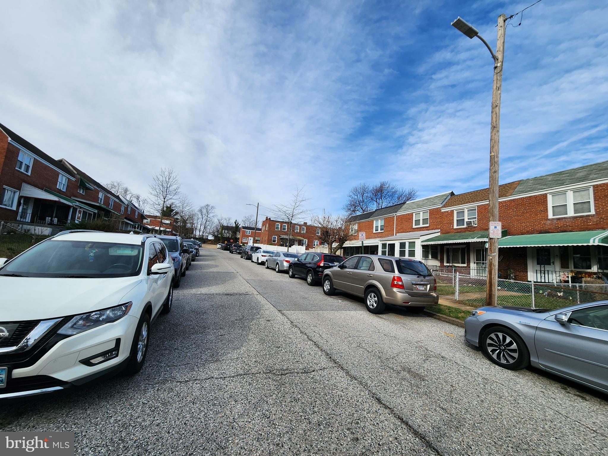 627 Cheraton Road Baltimore, MD 21225 - Photo 5 of 5 a car parked in front of a building