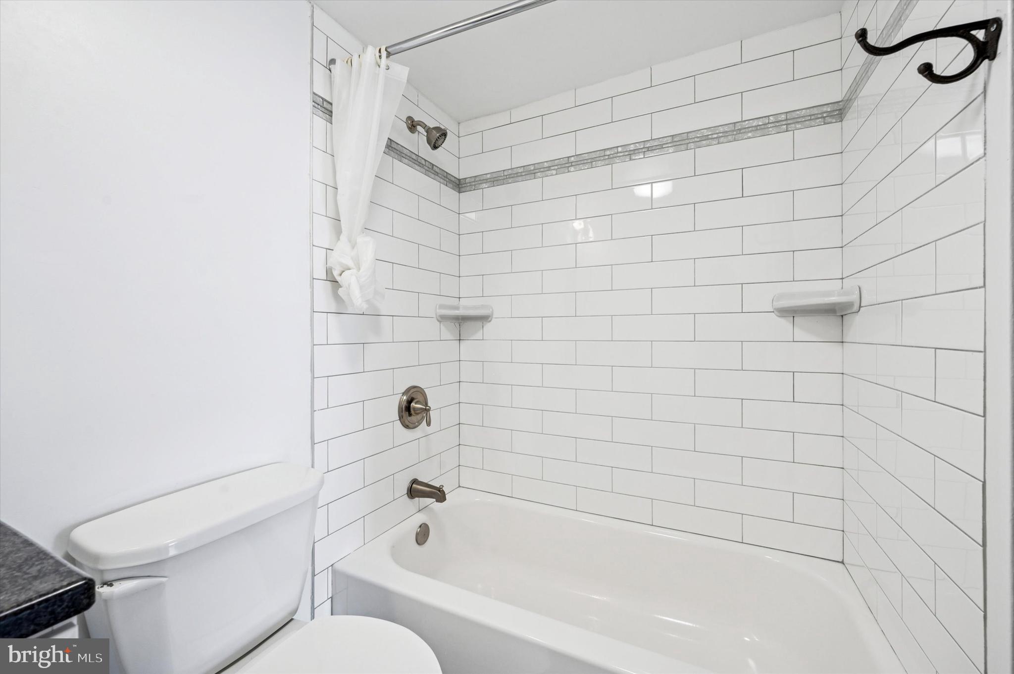 224 West Rittenhouse Square, Unit 715A Philadelphia, PA 19103 - Photo 17 of 47 a bathroom with a bathtub and a toilet