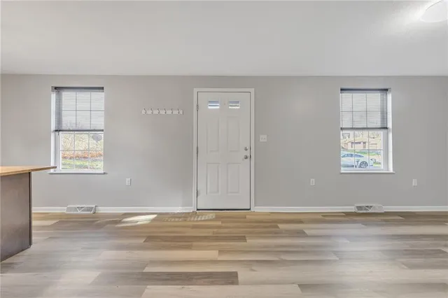 a house with yard in front of it