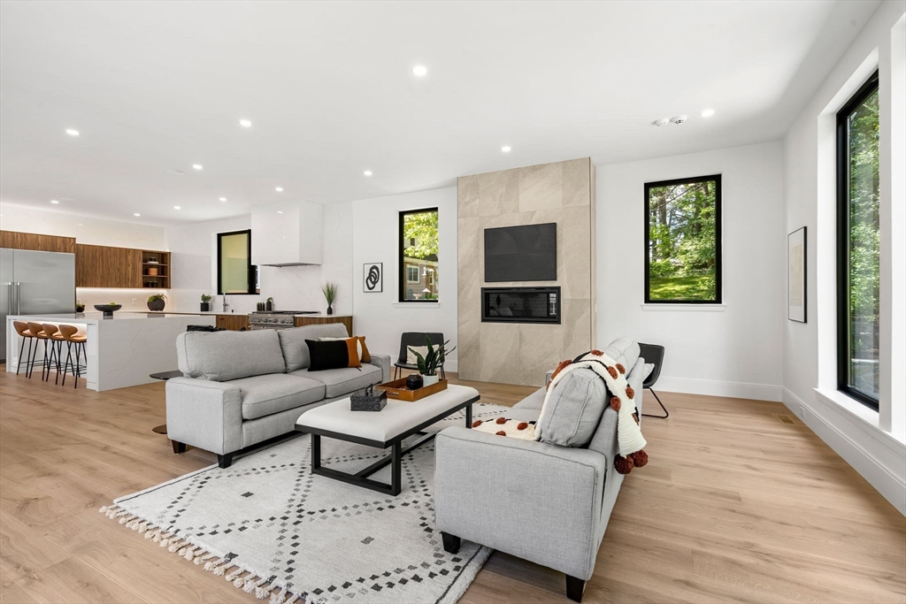 17 Prospect Hill Road Lexington, MA 02421 - Photo 12 of 42 a living room with furniture and a large window