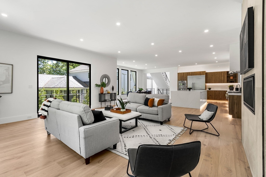 17 Prospect Hill Road Lexington, MA 02421 - Photo 13 of 42 a living room with furniture and a large window