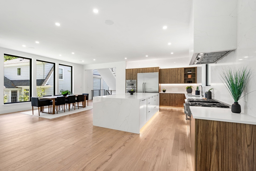 17 Prospect Hill Road Lexington, MA 02421 - Photo 15 of 42 a living room with furniture flat screen tv and couches