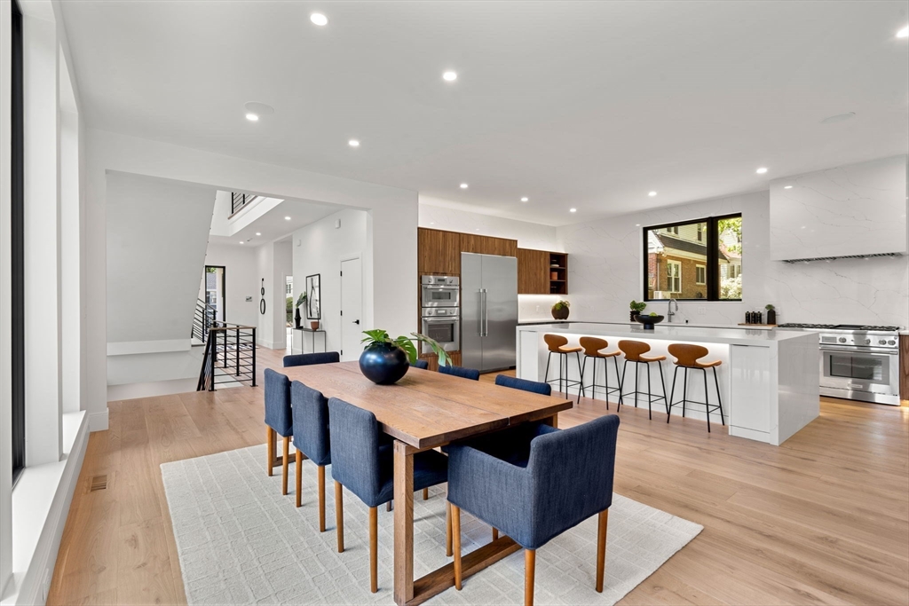 17 Prospect Hill Road Lexington, MA 02421 - Photo 18 of 42 a view of a dining area with furniture and wooden floor