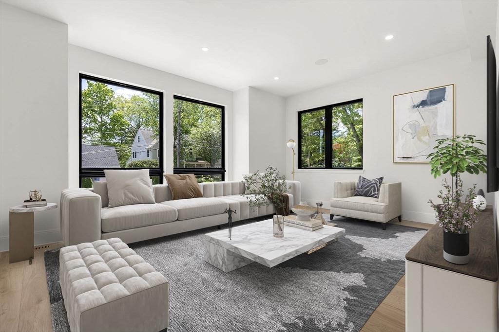 17 Prospect Hill Road Lexington, MA 02421 - Photo 23 of 42 a living room with furniture and a large window