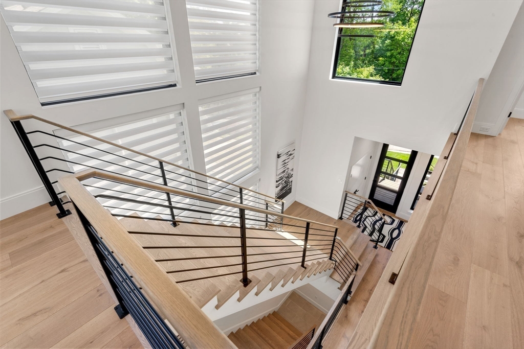 17 Prospect Hill Road Lexington, MA 02421 - Photo 25 of 42 a view of staircase with white walls and a window