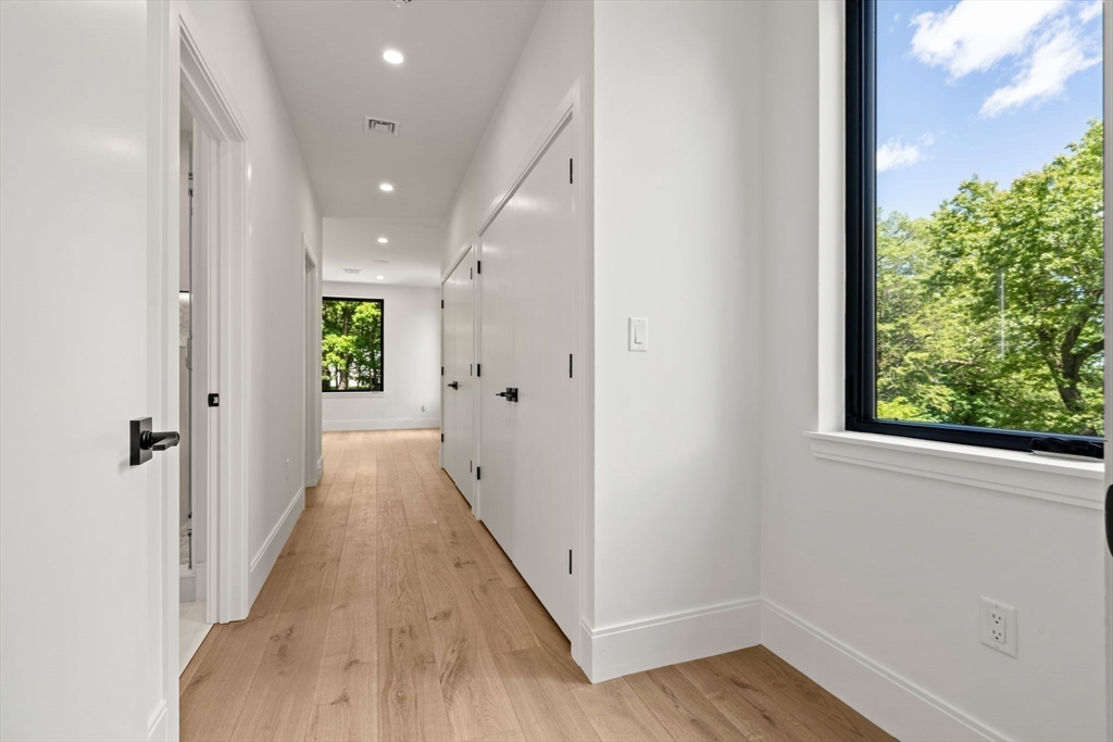 17 Prospect Hill Road Lexington, MA 02421 - Photo 27 of 42 a view of a hallway with wooden floor