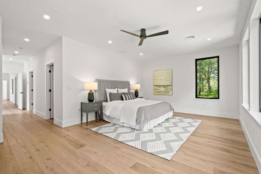 17 Prospect Hill Road Lexington, MA 02421 - Photo 32 of 42 a spacious bedroom with a bed and a window