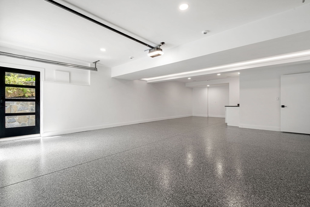 17 Prospect Hill Road Lexington, MA 02421 - Photo 41 of 42 wooden floor in an empty room with a window