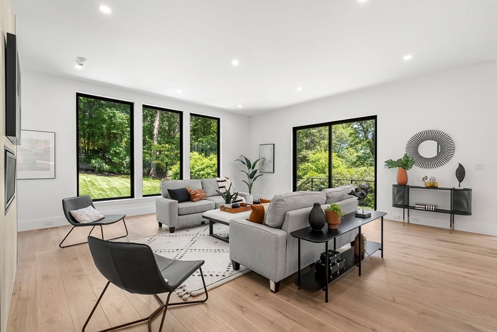 17 Prospect Hill Road Lexington, MA 02421 - Photo 9 of 42 a living room with furniture and a large window