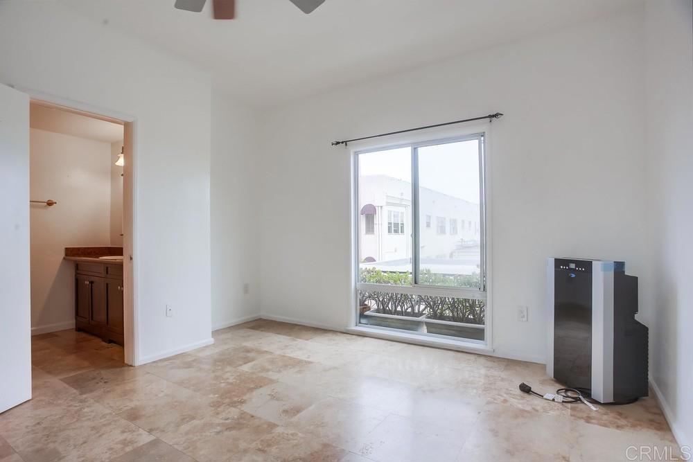 1295 Prospect Street, Unit D La Jolla, CA 92037 - Photo 14 of 24 an empty room with windows and entrance