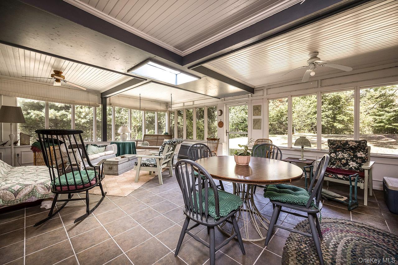53 Tyrrel Road Pleasant Valley, NY 12569 - Photo 13 of 35 a dining room with furniture and wooden floor