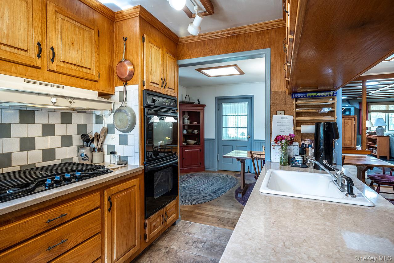 53 Tyrrel Road Pleasant Valley, NY 12569 - Photo 17 of 35 a kitchen with stainless steel appliances granite countertop a stove and a refrigerator