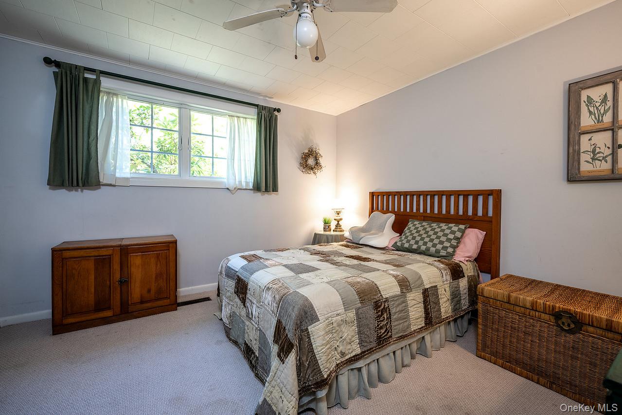 53 Tyrrel Road Pleasant Valley, NY 12569 - Photo 22 of 35 a bedroom with a bed and a window