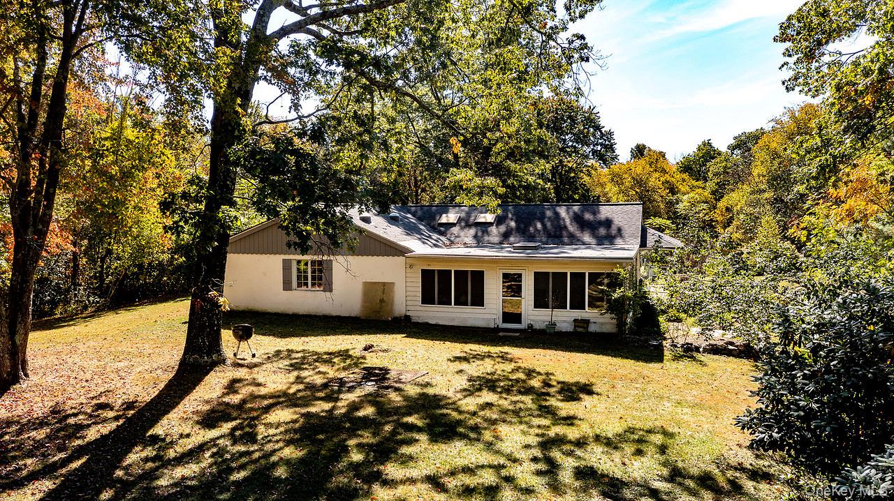 53 Tyrrel Road Pleasant Valley, NY 12569 - Photo 33 of 35 front view of a house with a yard