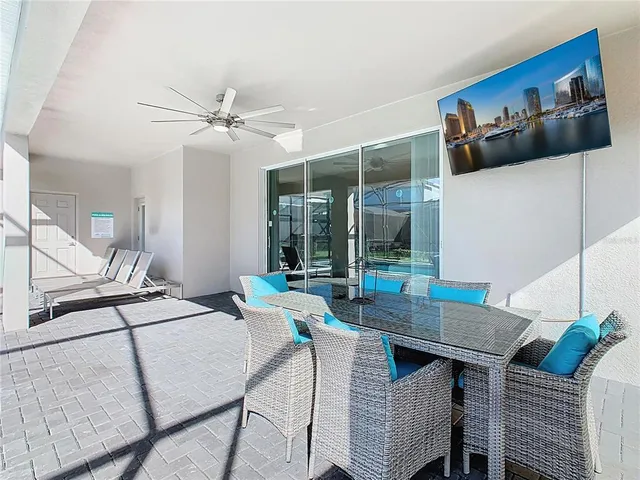 a living room with a floor to ceiling window and floor