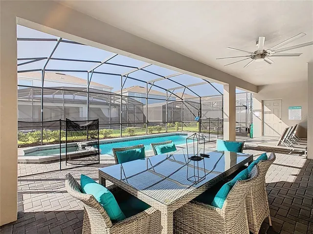 a view of a backyard with a tub