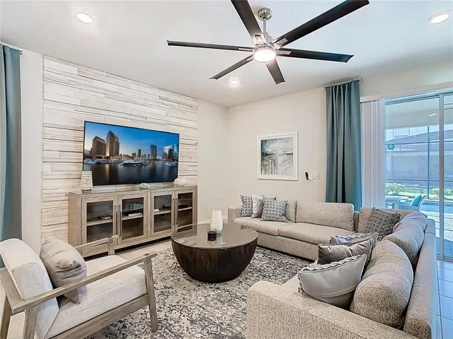 a view of kitchen with sink dining table and chairs