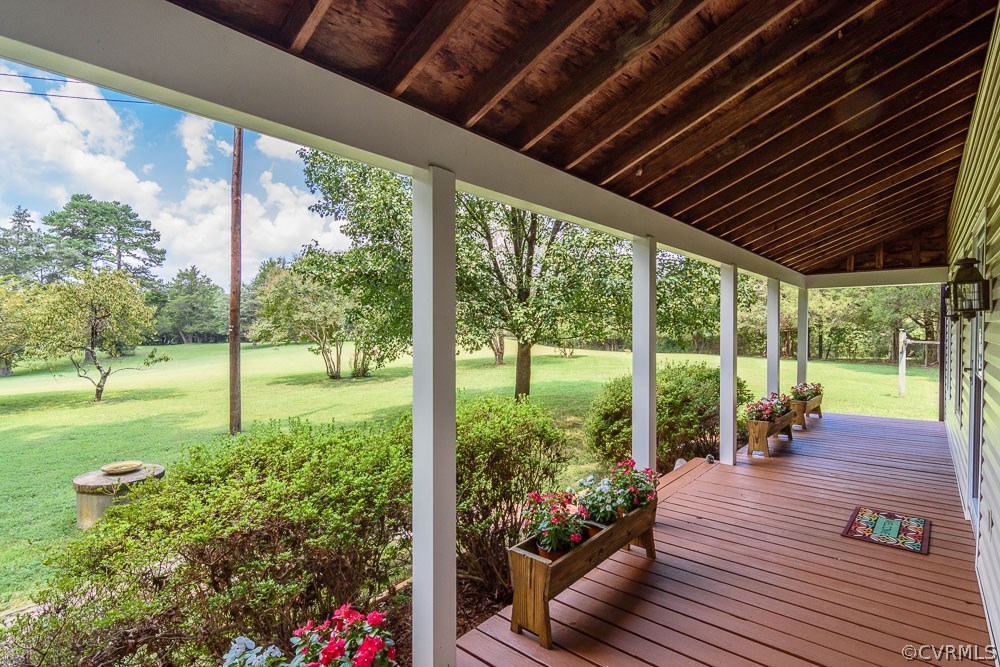 11468 Hanover Courthouse Road Hanover, VA 23069 - Photo 5 of 46 a view of a porch with furniture and wooden floor