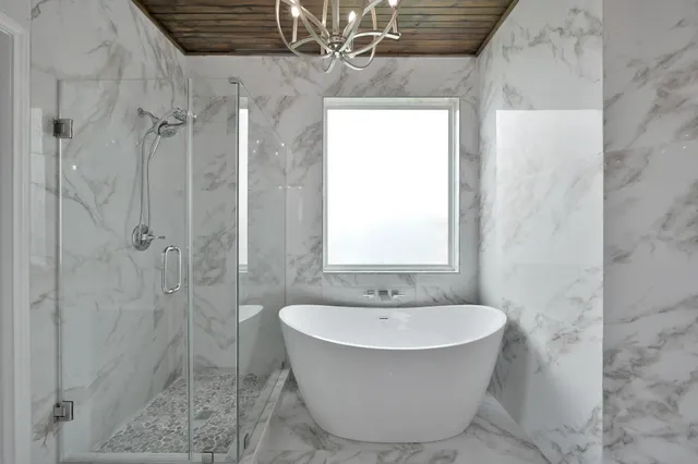 a bathroom with a double vanity sink and mirror
