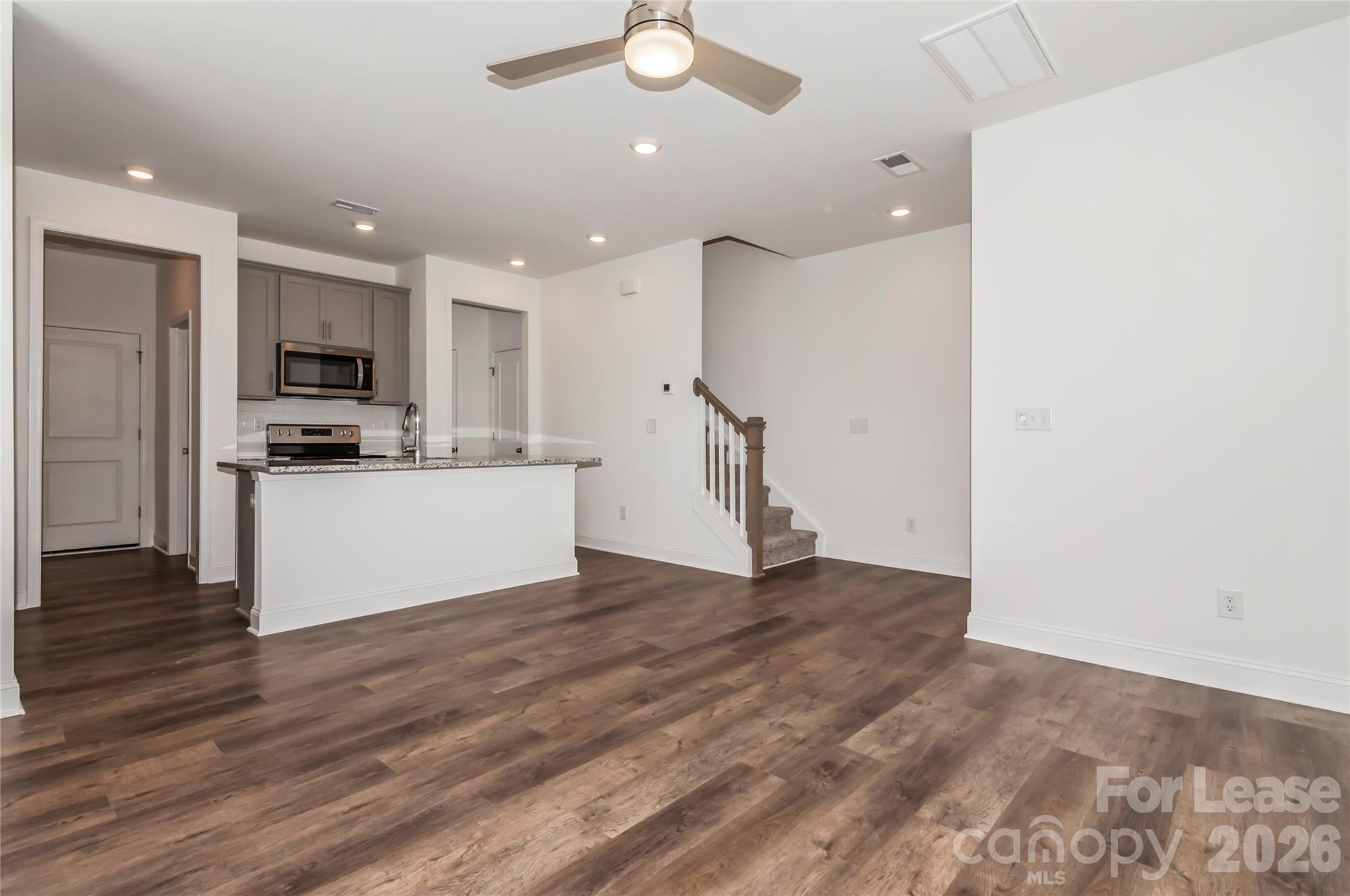 6002 Cedar Chip Way Matthews, NC 28105 - Photo 13 of 35 a view of a kitchen with a sink and a refrigerator