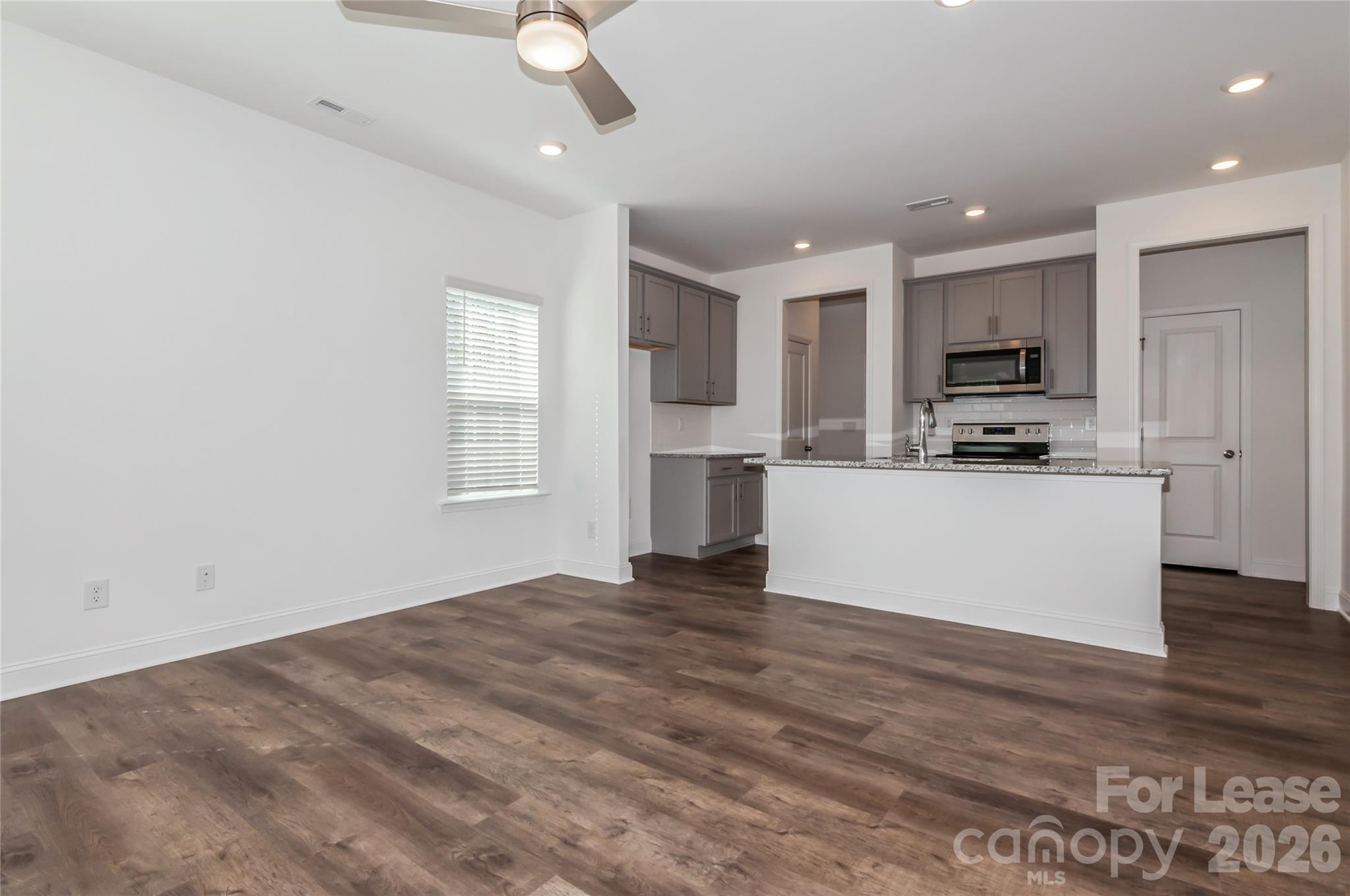 6002 Cedar Chip Way Matthews, NC 28105 - Photo 16 of 35 a view of kitchen with refrigerator stove and microwave