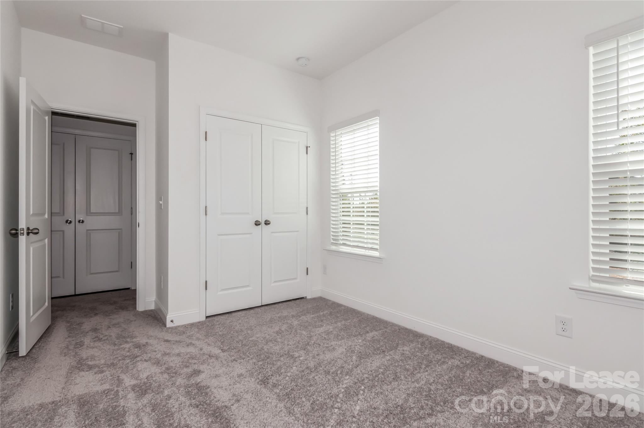 6002 Cedar Chip Way Matthews, NC 28105 - Photo 21 of 35 an empty room with windows