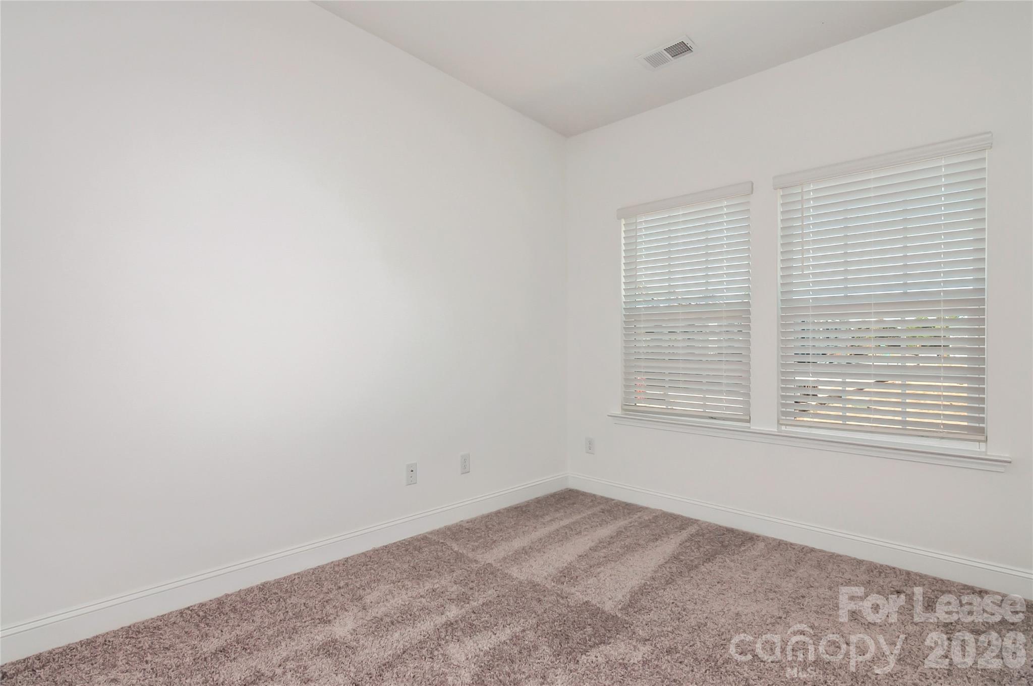 6002 Cedar Chip Way Matthews, NC 28105 - Photo 24 of 35 an empty room with a window