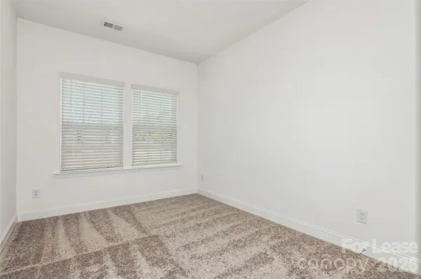 a view of a room with a window