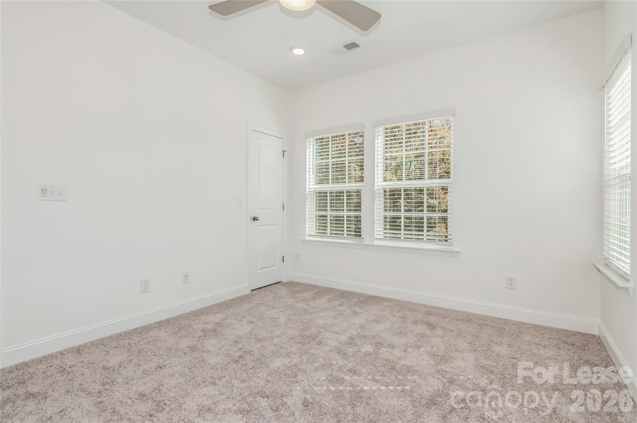 6002 Cedar Chip Way Matthews, NC 28105 - Photo 29 of 35 an empty room with windows