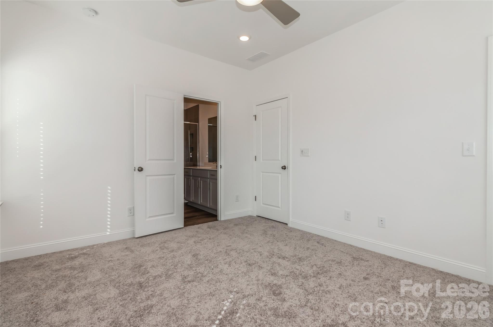 6002 Cedar Chip Way Matthews, NC 28105 - Photo 30 of 35 an empty room with an entryway