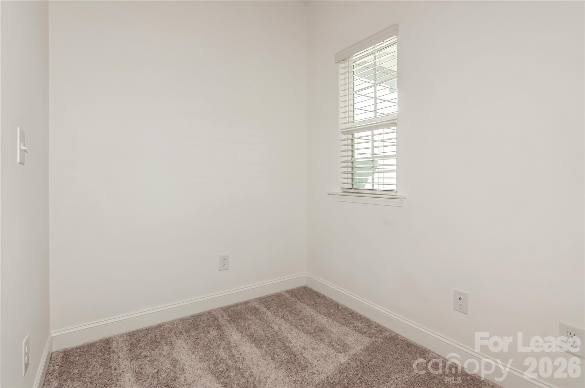 6002 Cedar Chip Way Matthews, NC 28105 - Photo 33 of 35 an empty room with a window