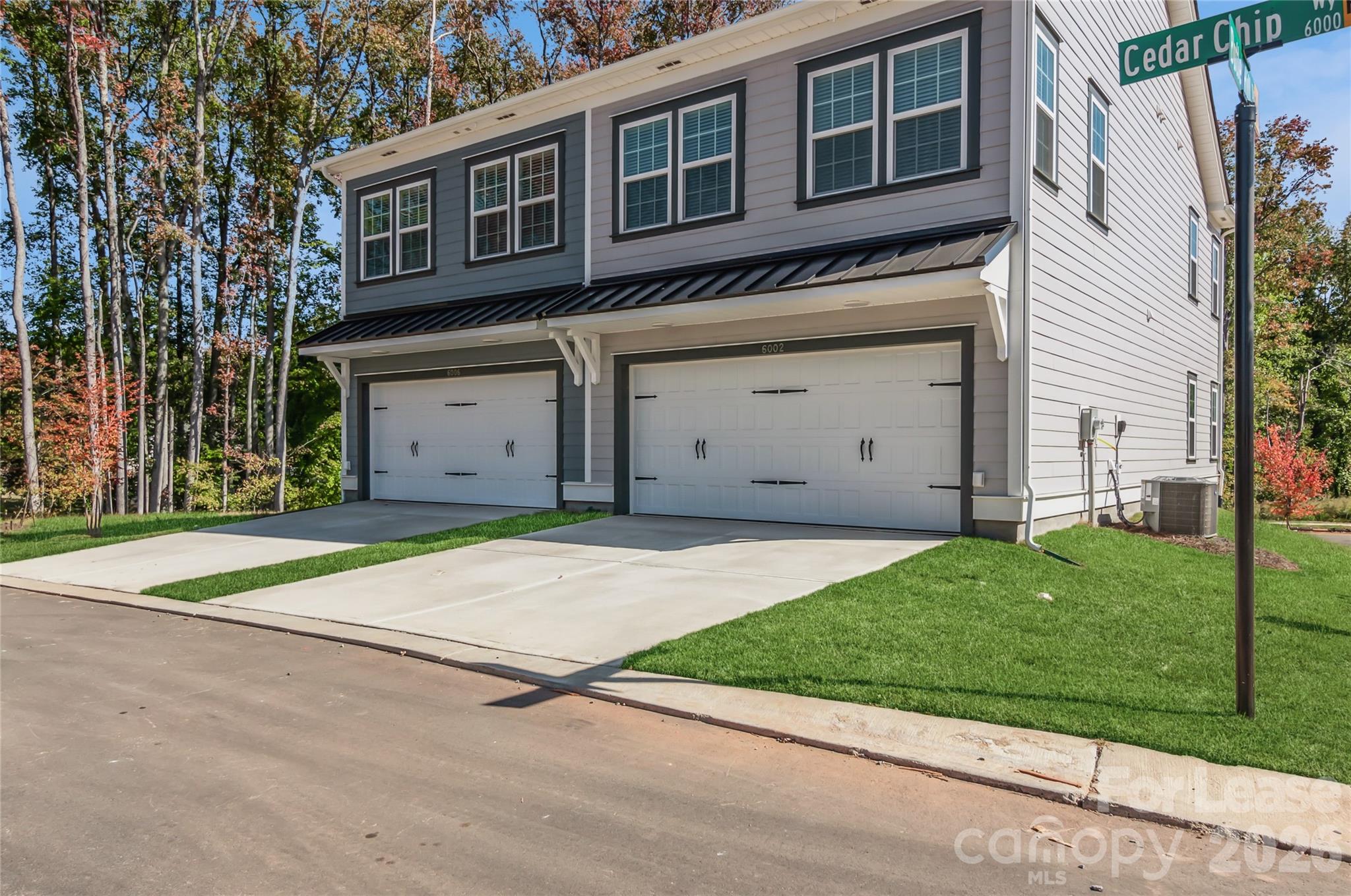 6002 Cedar Chip Way Matthews, NC 28105 - Photo 7 of 35 a view of a house with a backyard