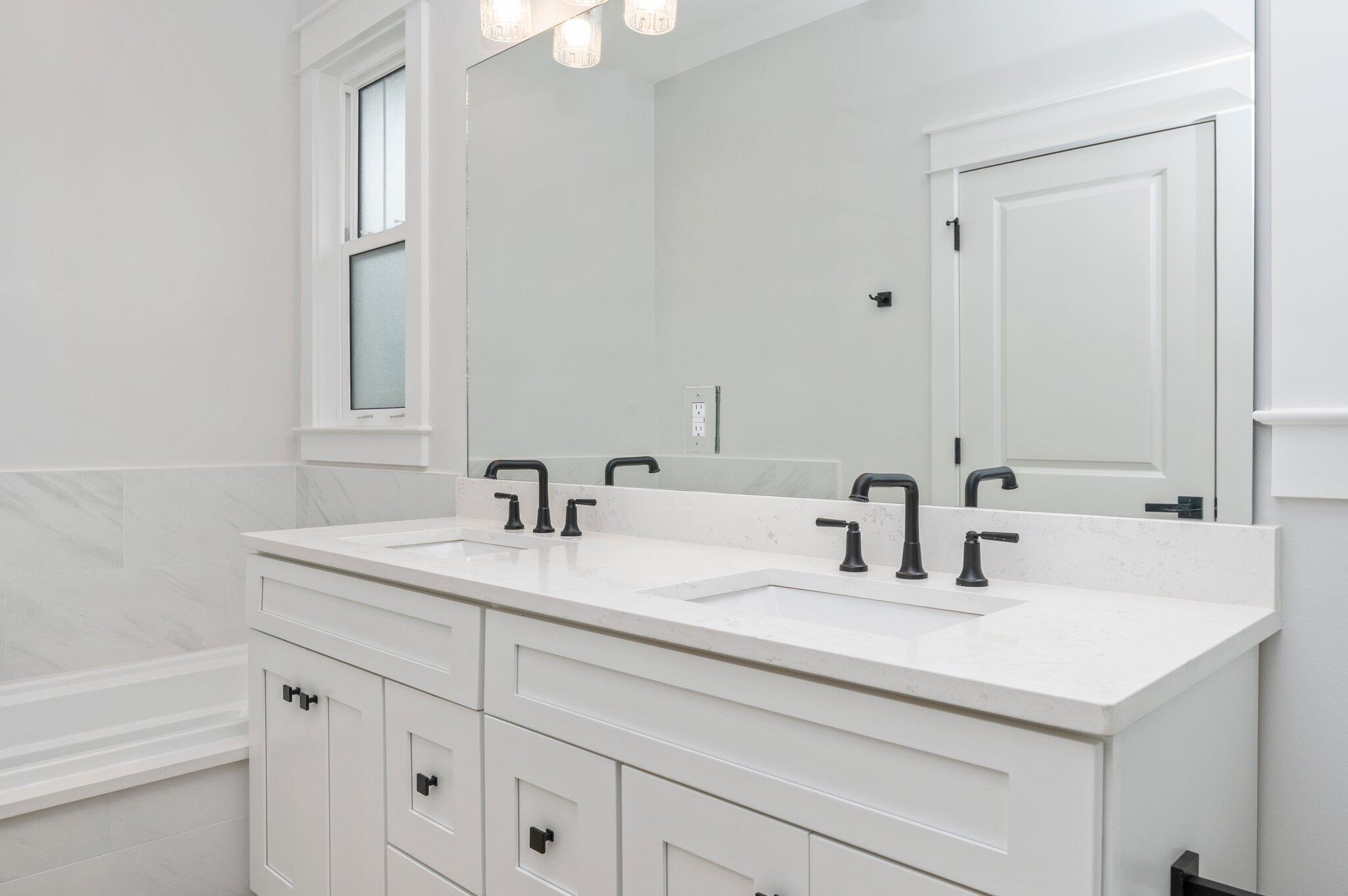 1110 Co Highway 3280 Freeport, FL 32439 - Photo 15 of 39 a bathroom with double sink and a mirror