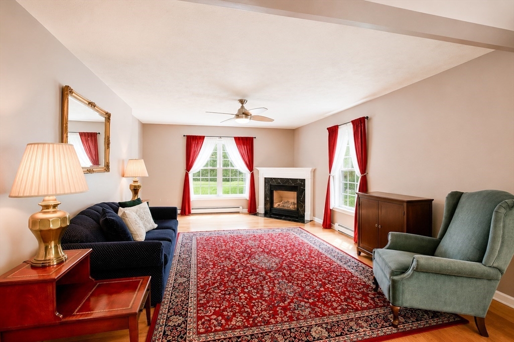 6 Loon Road Winchendon, MA 01475 - Photo 7 of 36 a living room with furniture and a fireplace