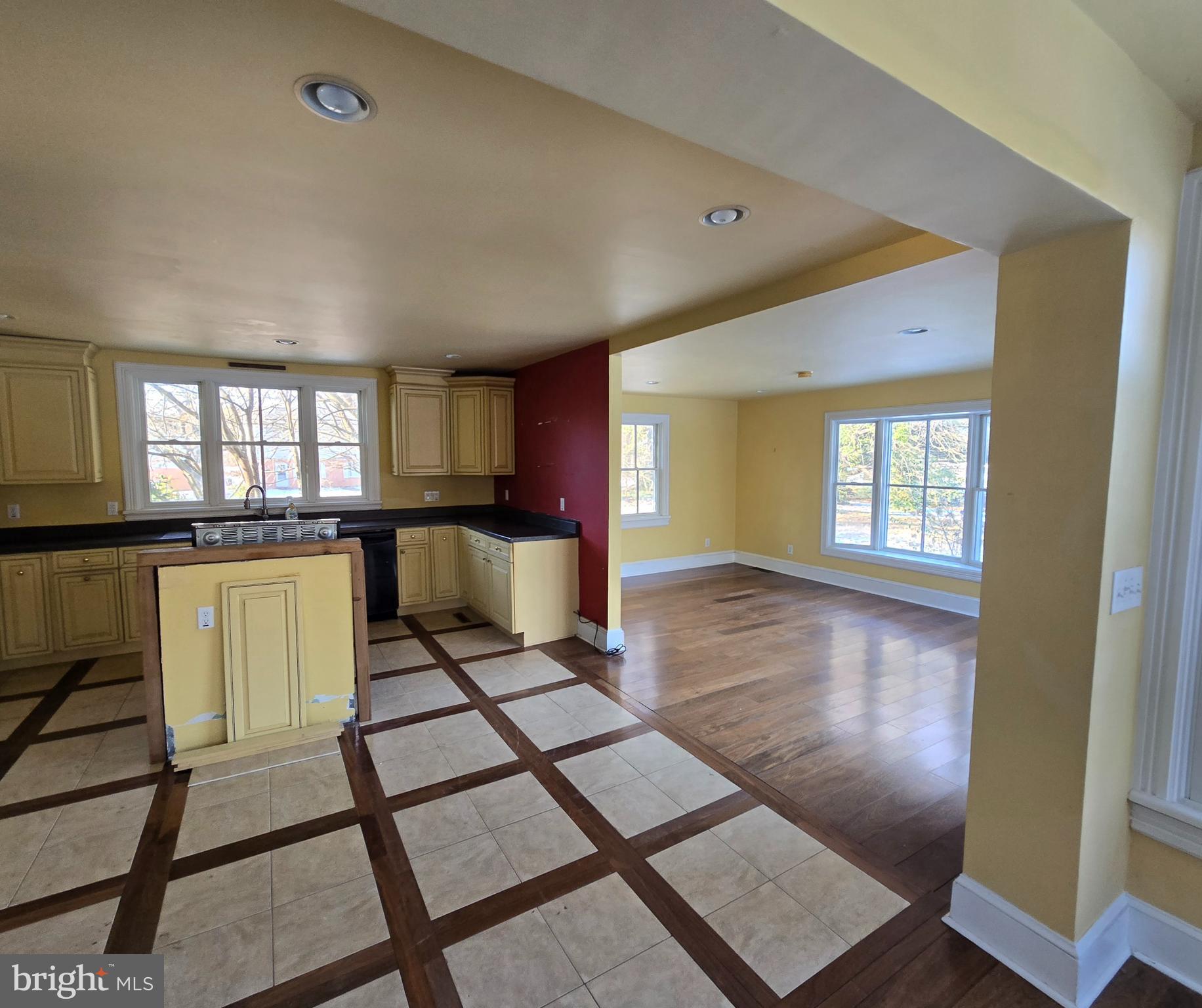 101 Chapel Road Easton, MD 21601 - Photo 29 of 35 a view of kitchen and dining room with wooden floor