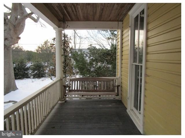 101 Chapel Road Easton, MD 21601 - Photo 3 of 35 a view of porch with a chair