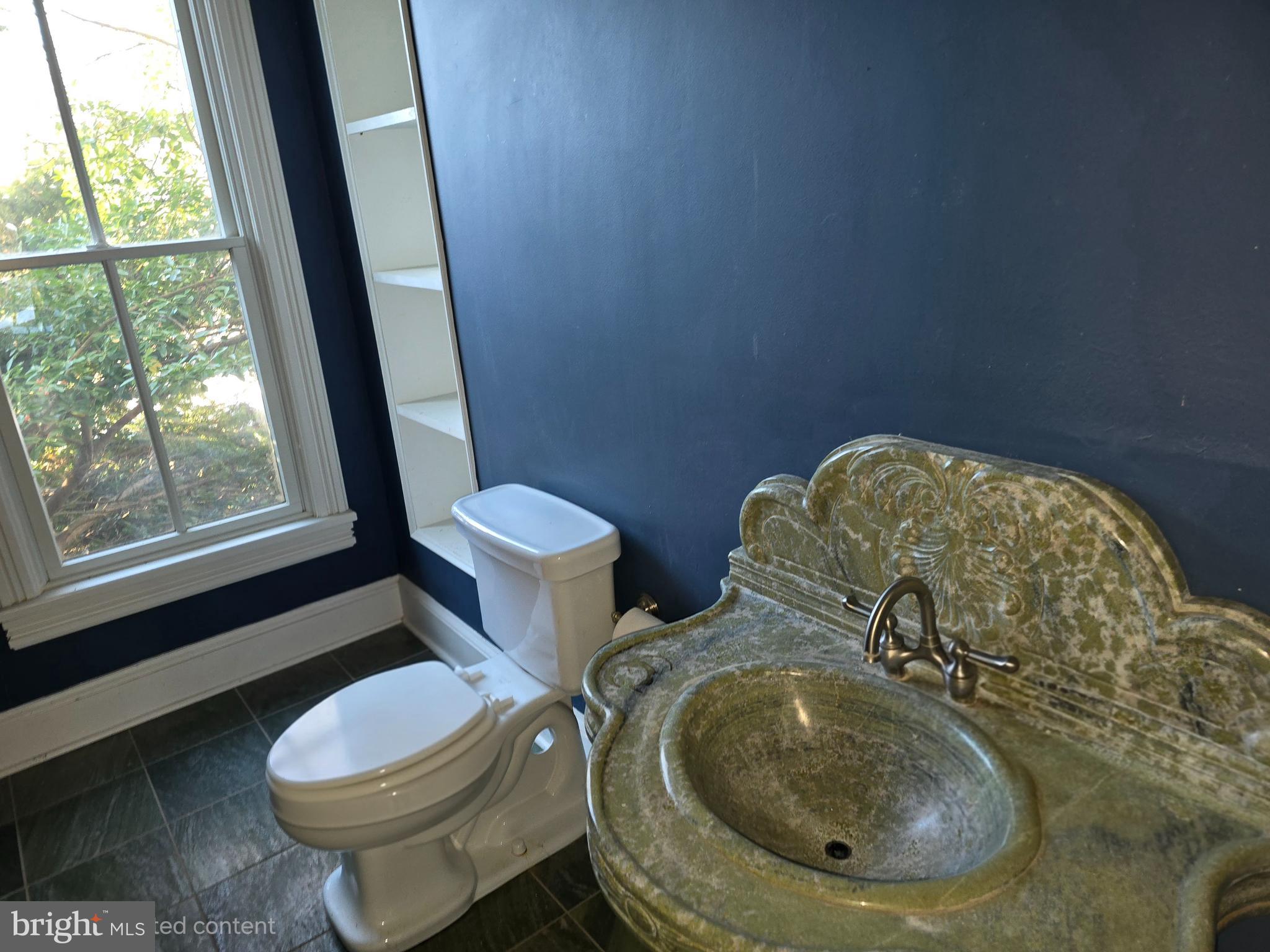 101 Chapel Road Easton, MD 21601 - Photo 35 of 35 a bathroom with a toilet and a sink