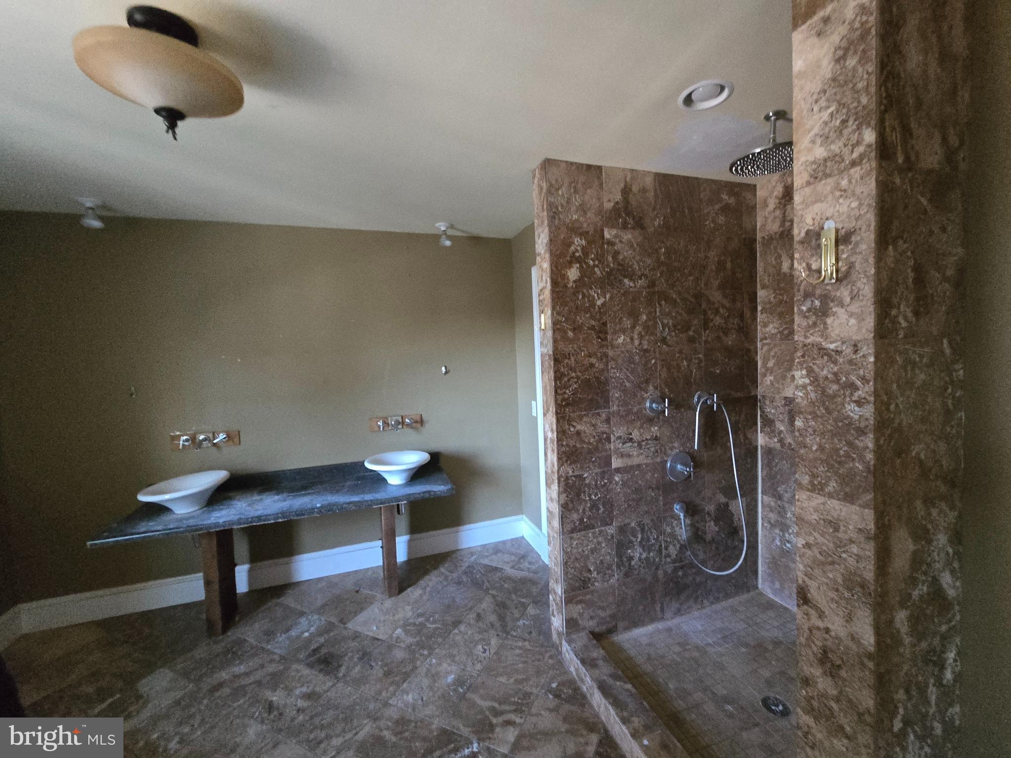 101 Chapel Road Easton, MD 21601 - Photo 9 of 35 a room with a table and chairs