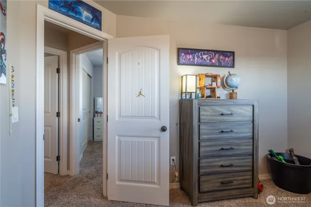 a view of a hallway with closet