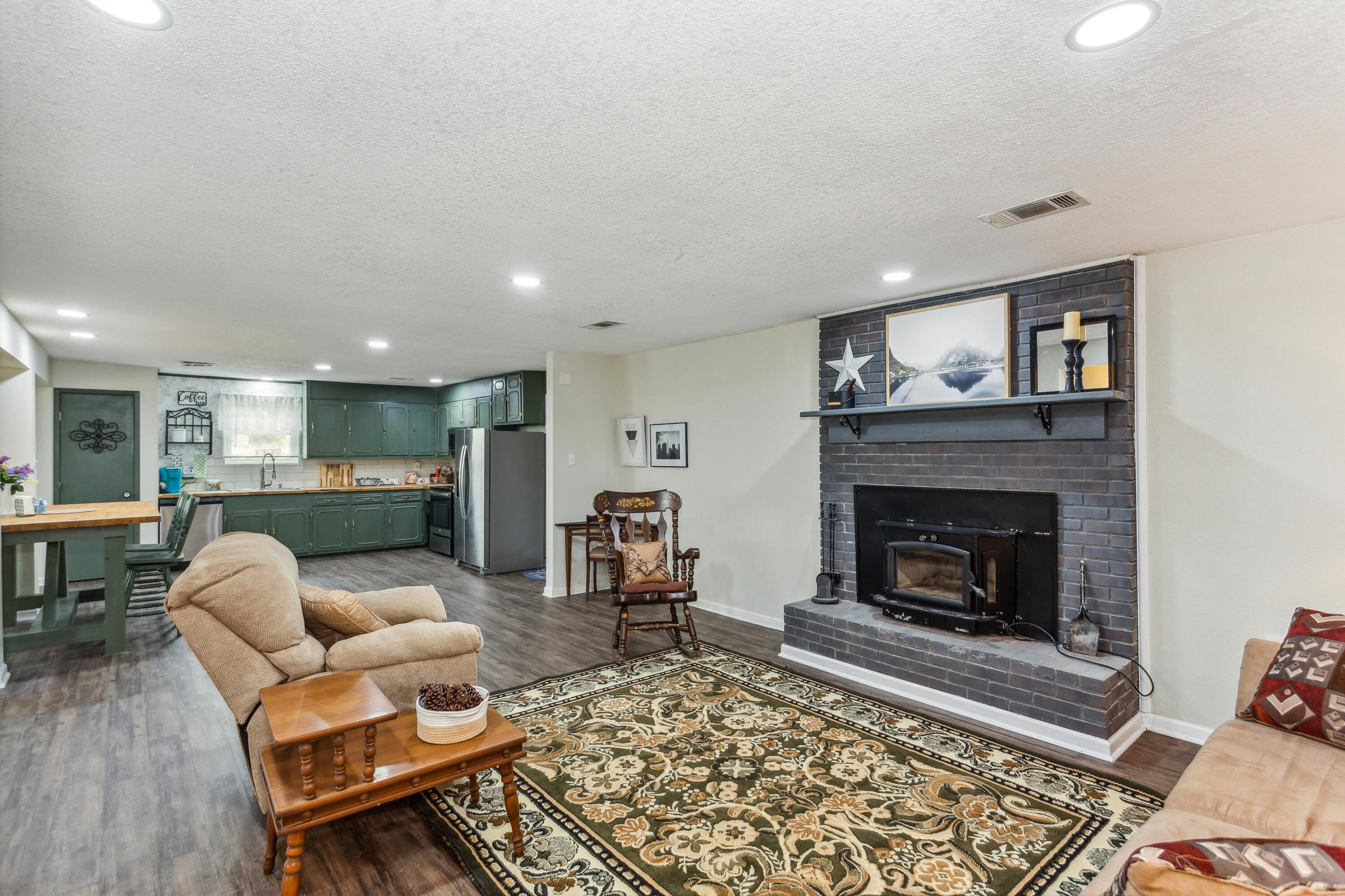 1956 Well Line Road Cantonment, FL 32533 - Photo 8 of 29 a living room with furniture and a fireplace