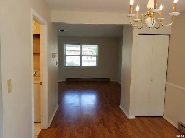 a kitchen with a stove microwave and sink