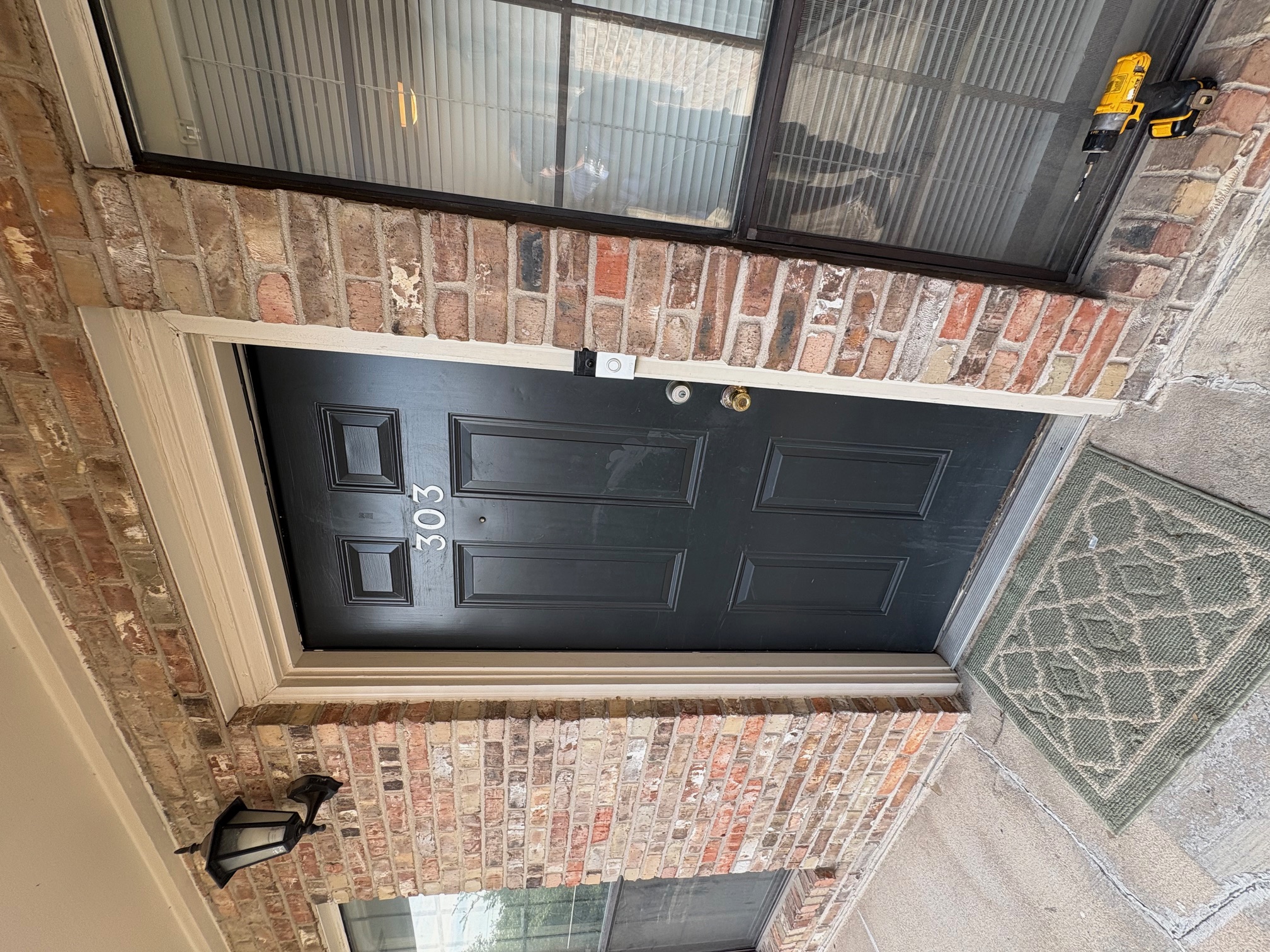 2801 Rio Grande Street, Unit 303 Austin, TX 78705 - Photo 4 of 11 Entrance to property with brick siding