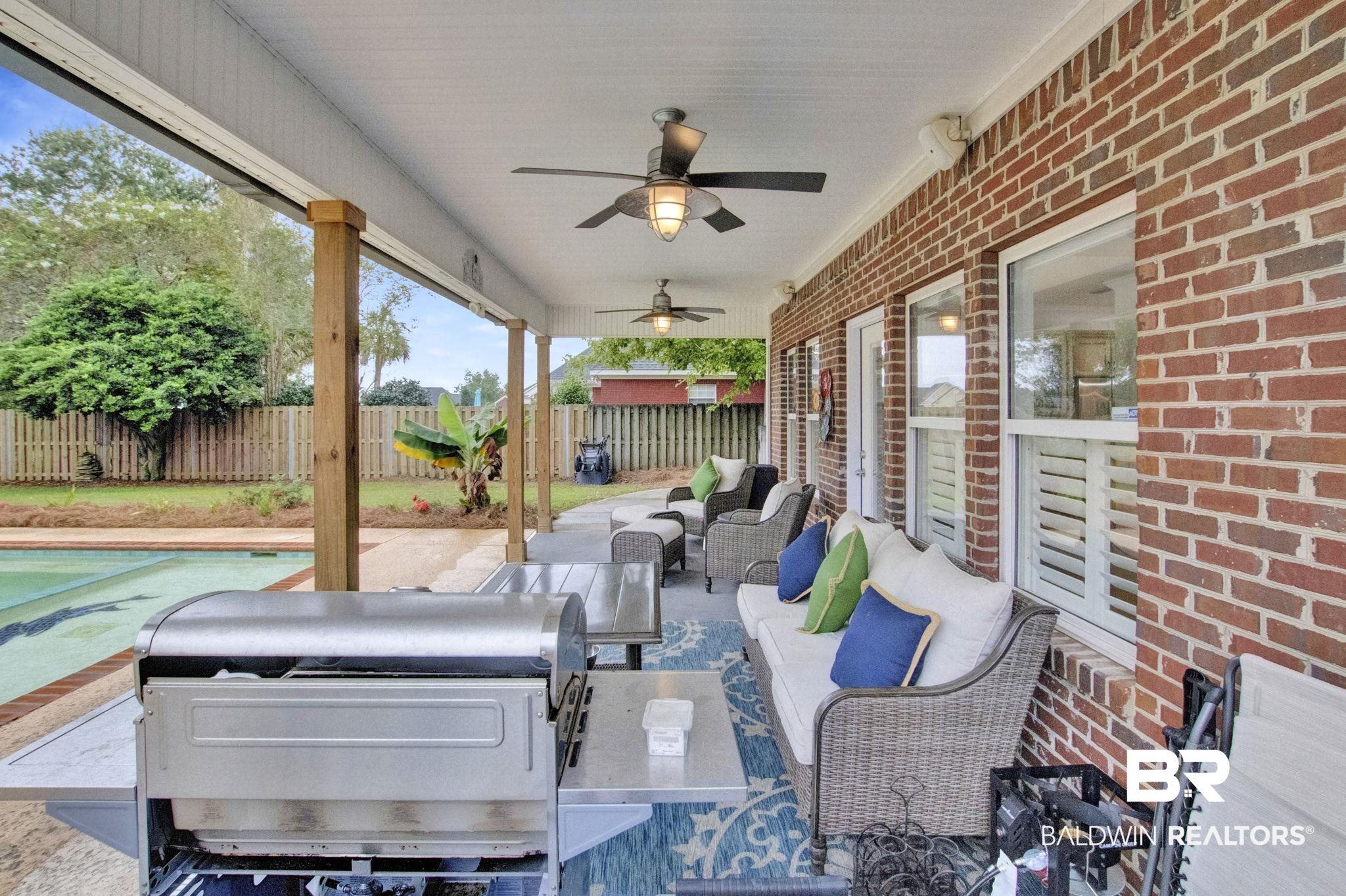 9002 Parliament Circle Daphne, AL 36526 - Photo 67 of 73 View of covered patio with ceiling fan and an outdoor hangout area