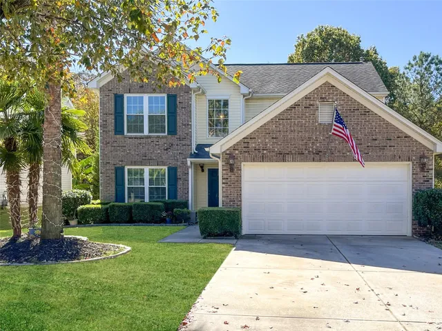 a view of front a house with garage