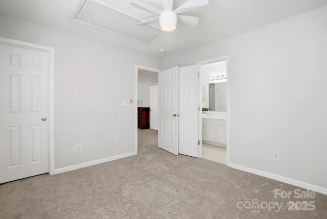 an empty room with a bathroom